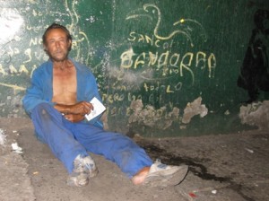 homeless man in barrio triste medellin 300x224 Homeless Colombia 
