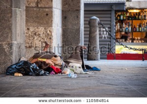 stock photo homeless person sleeping on the street in milan italy 110584814 300x212 stock photo homeless person sleeping on the street in milan italy 110584814